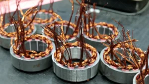 Finished motor stator windings for industrial submersible pump assembly.